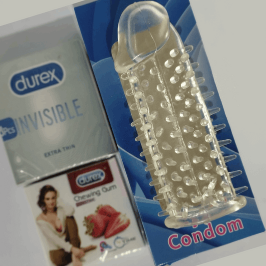 Durex Invisible condoms and a clear plastic tool on a white background